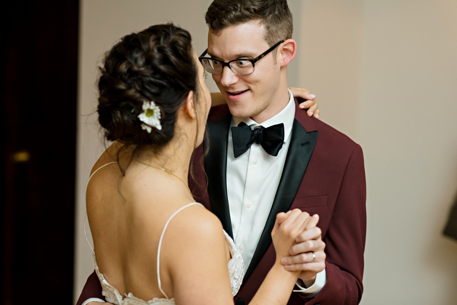 A bride and groom share their first dance.